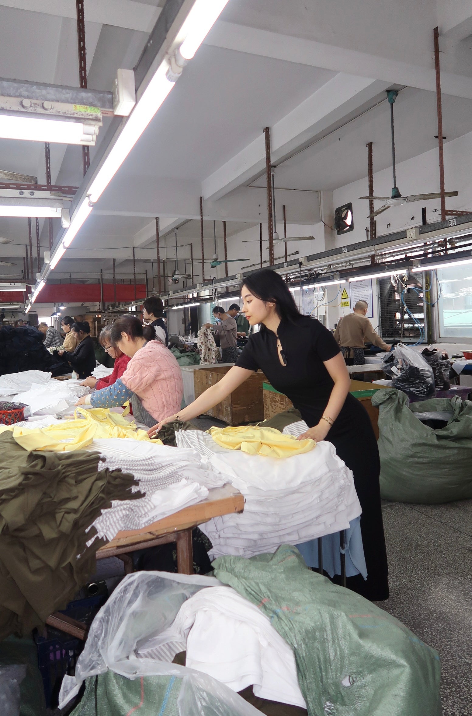 The founder checking the dresses